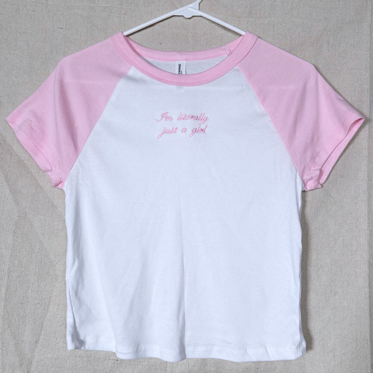 I'm Literally Just A Girl Embroidered Cropped Raglan Baby Tee